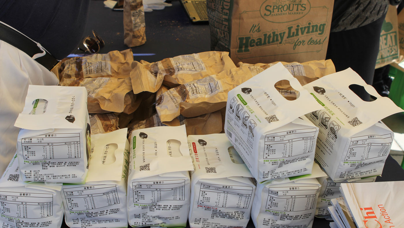 Tzu Chi USA provides Jing Si multi-grain biscuits and instant rice at the Mt. SAC food pantry. Photo by Michael Tseng.