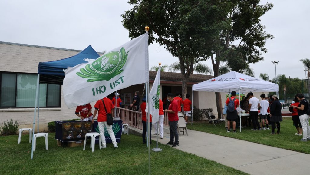 Tzu Chi volunteers set up an on-site booth to introduce the Buddhist Tzu Chi Foundation and its missions to visitors
