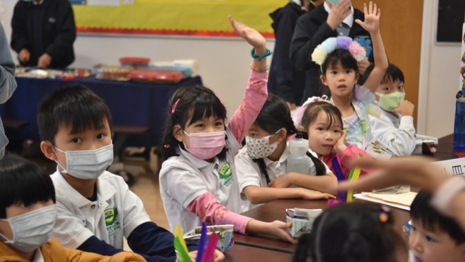 Tzu Chi Portland-Academy students answering eco quiz