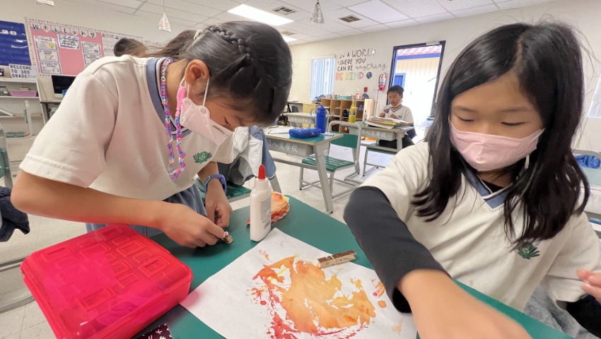 Tzu Chi Walnut Elementary School students creating paper turkey