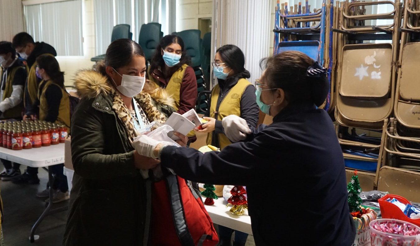 Tzu Chi volunteers distributing winter
