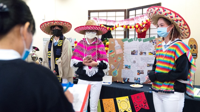 NCA Tzu Chi High School students introducing the Mexican booth