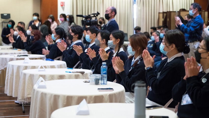 NCA Tzu Chi High School Iron Chef Competition judges clapping hands