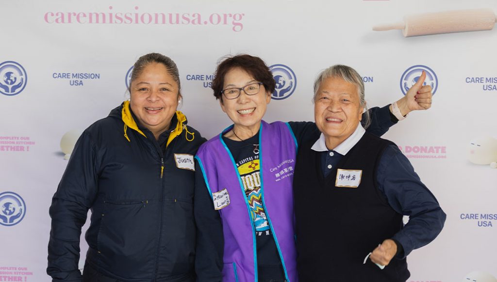 Tzu Chi volunteer Kunrong Xie (from left to right), Care Mission director Catherine Lan, and local volunteer Judith