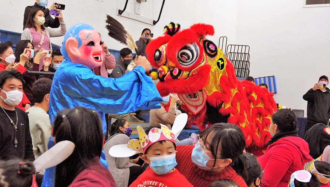 Parents, Tzu Chi Academy students and teachers enjoying Lunar New Year celebration