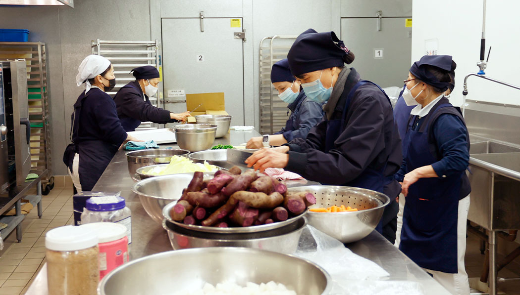 Tzu Chi volunteers preparing meals