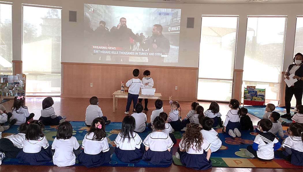 Tzu Chi Education teacher and students watching videos about Turkey Earthquake