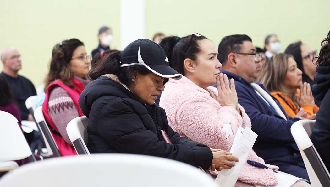 Houston Tornado Relief recipients and Tzu Chi USA praying together