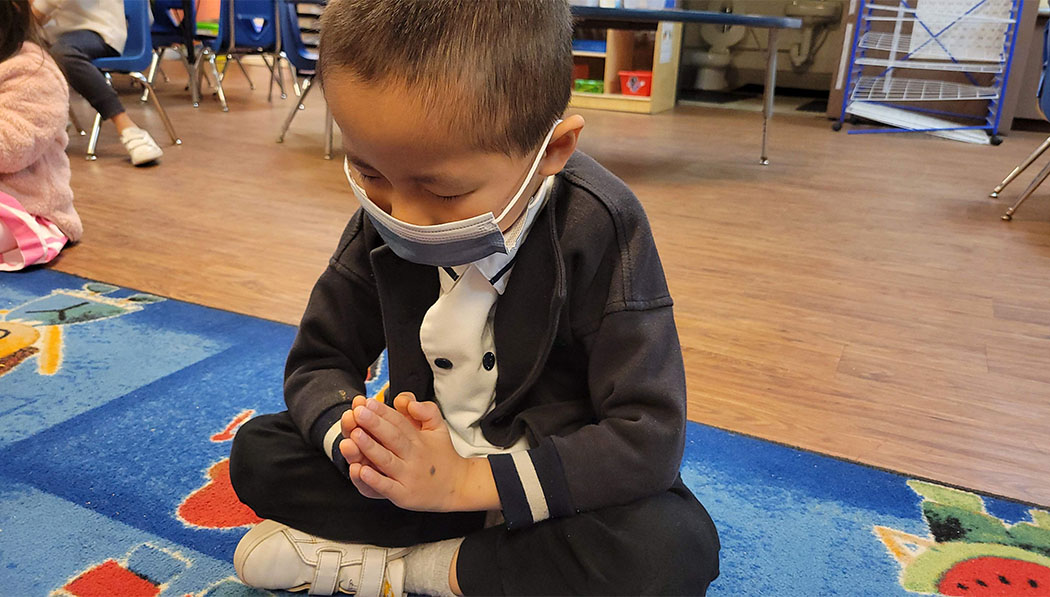 Tzu Chi Preschool student praying for Turkey