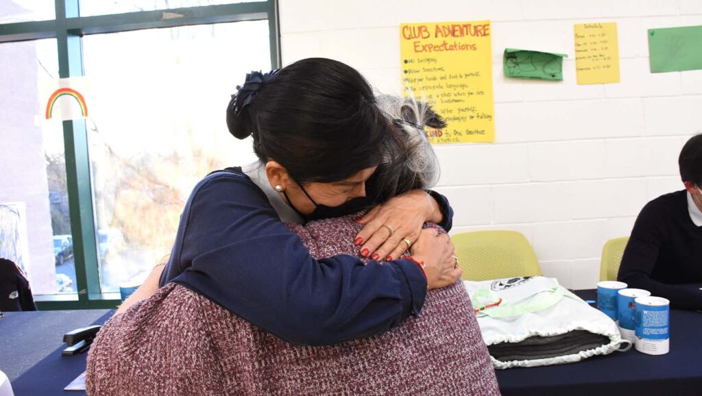 Tzu Chi volunteer embraces Silver Spring Apartments Fire survivor