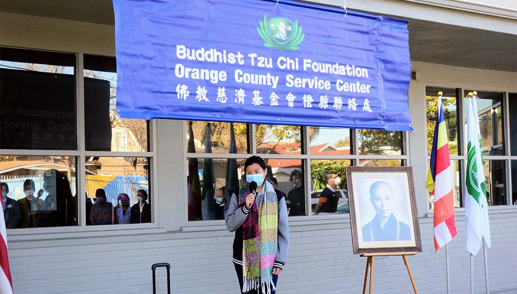 Tzu Chi volunteer giving talks