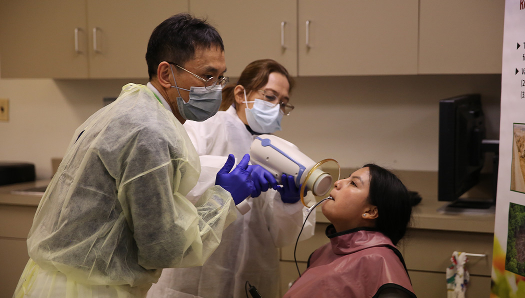 Tzu Chi dental volunteers giving dental treatment