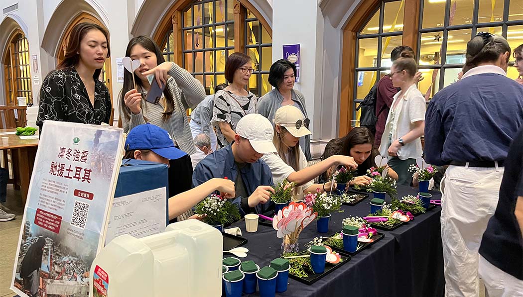 Volunteers and visitor floral arranging