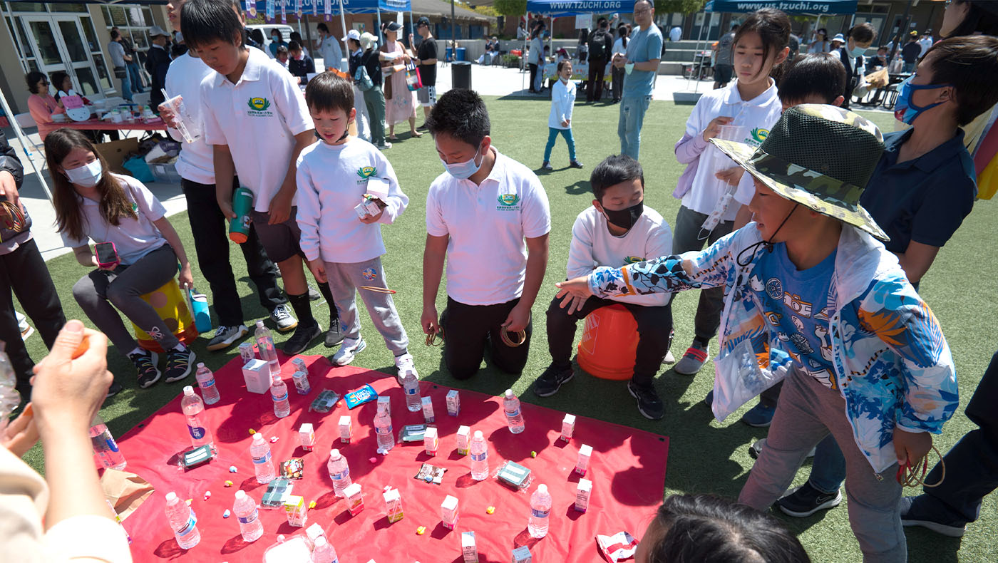 Tzu Chi Academy Cupertino’s student playing game in their first school fair