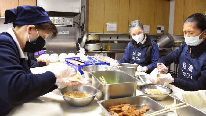 Tzu Chi volunteers making vegetarian Gua bao