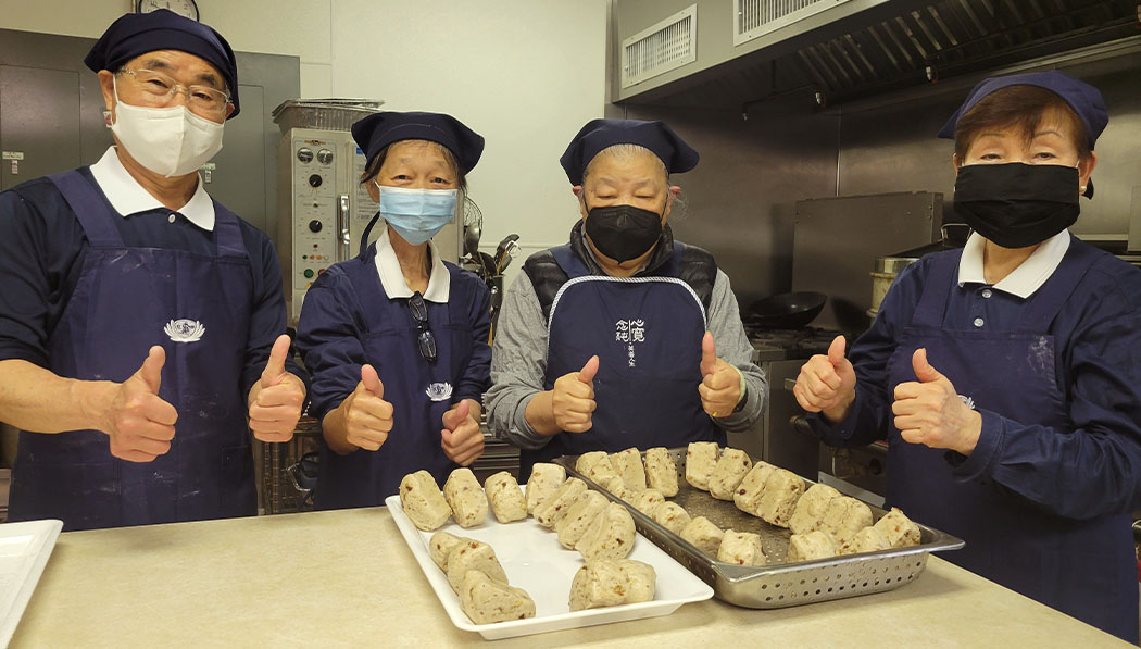 Tzu Chi volunteers and their mixed nuts bun
