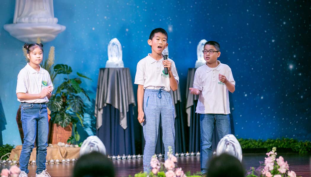 Tzu Chi Houston Academy student performing on the stage
