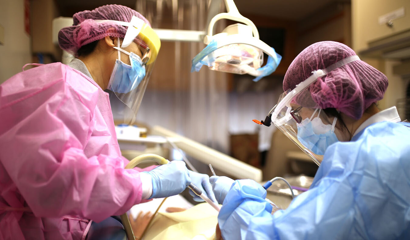 Dentists giving dental treatment