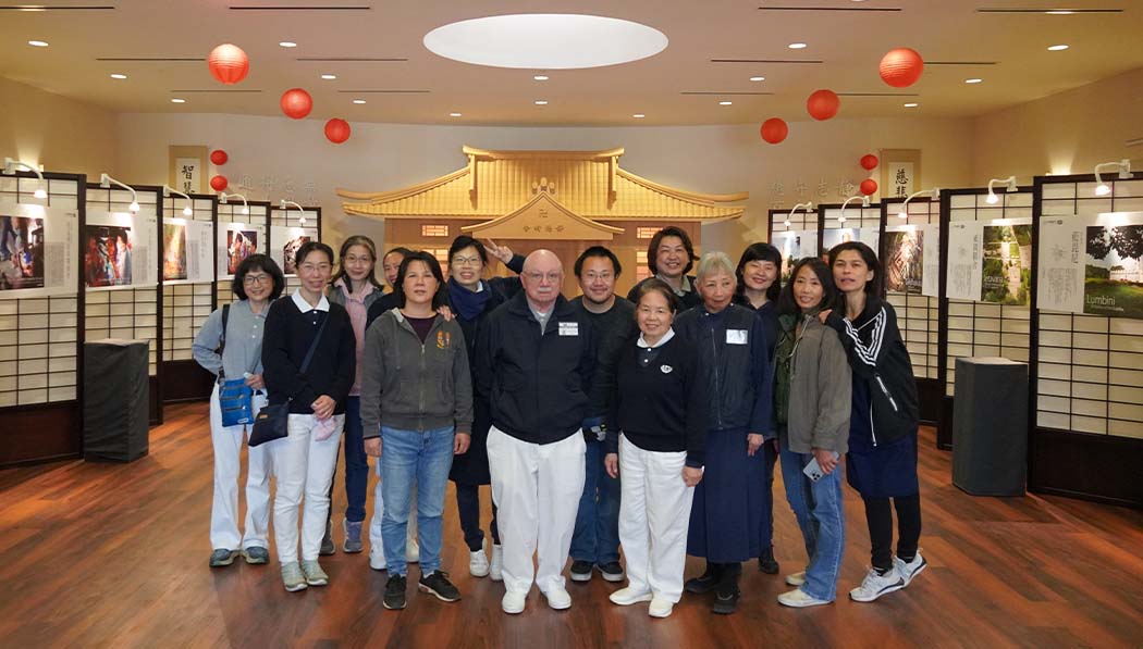 Tzu Chi volunteers and visitors group photo