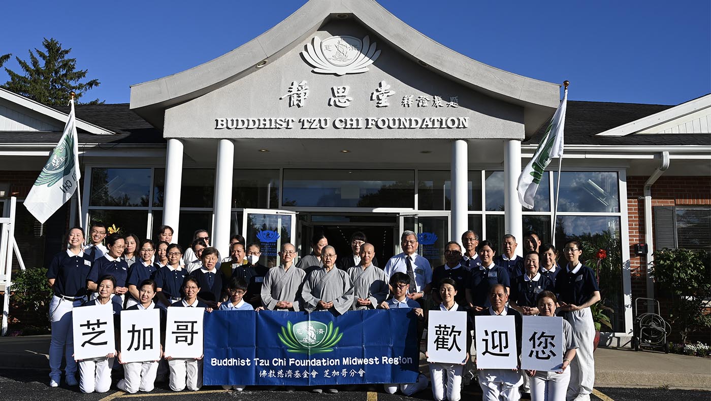 Tzu Chi volunteers and team members at Tzu Chi USA's Midwest Region Office prepare a warm welcome for the venerable Dharma Masters.