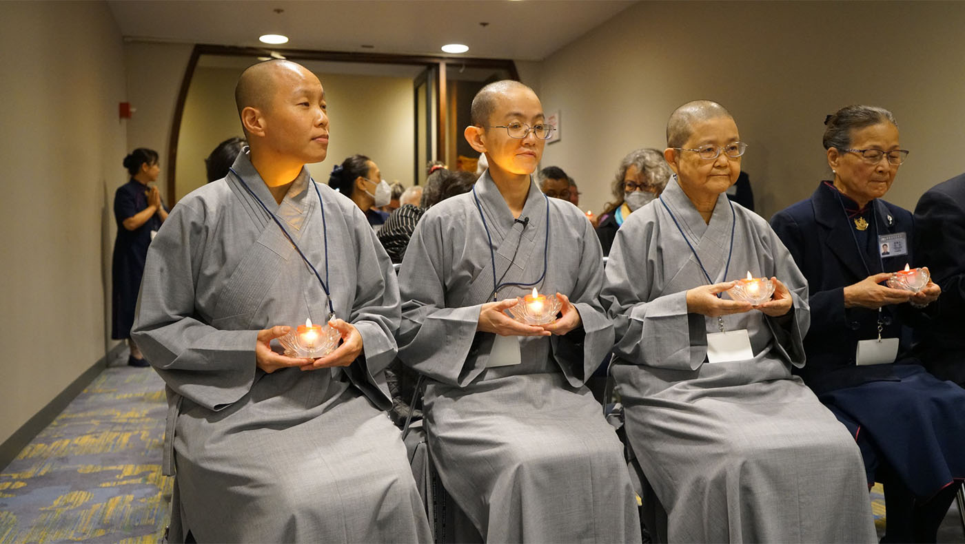 Tzu Chi Dharma Masters holding lotus lmap