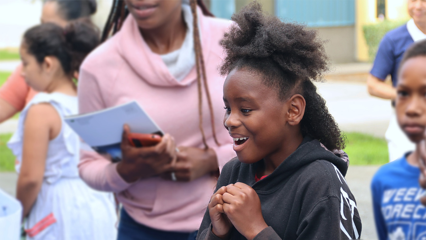 Little girl showing exciting face