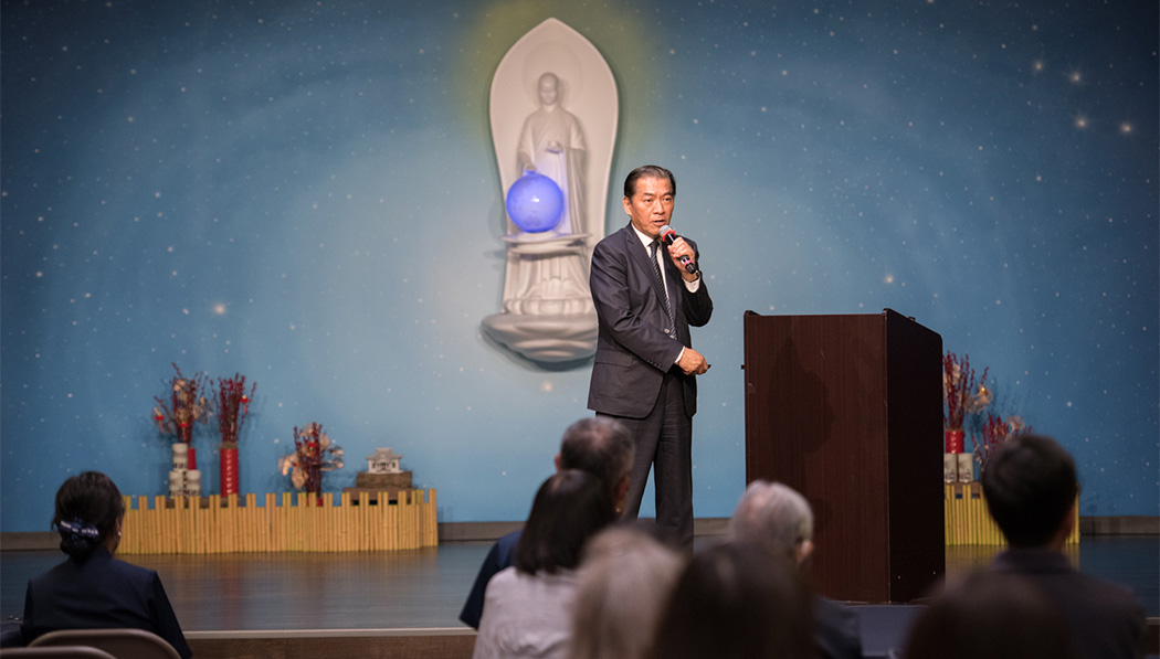 Tzu Chi USA deputy CEO giving speech