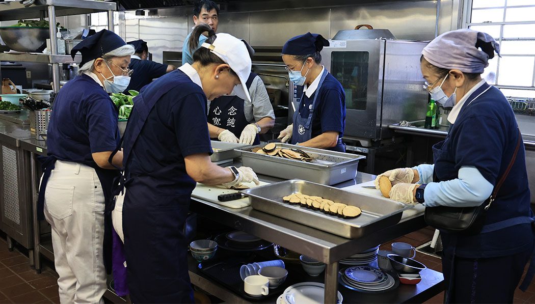 Culinary team preparing vegetarian meals
