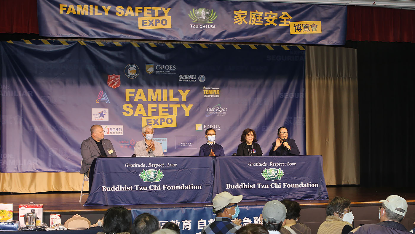 Tzu Chi USA CEO giving speech for End of the Season Family Safety Expo