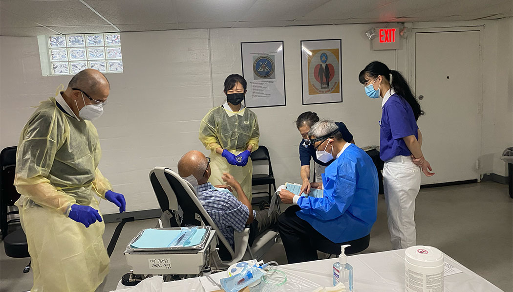 Dentists giving treatment