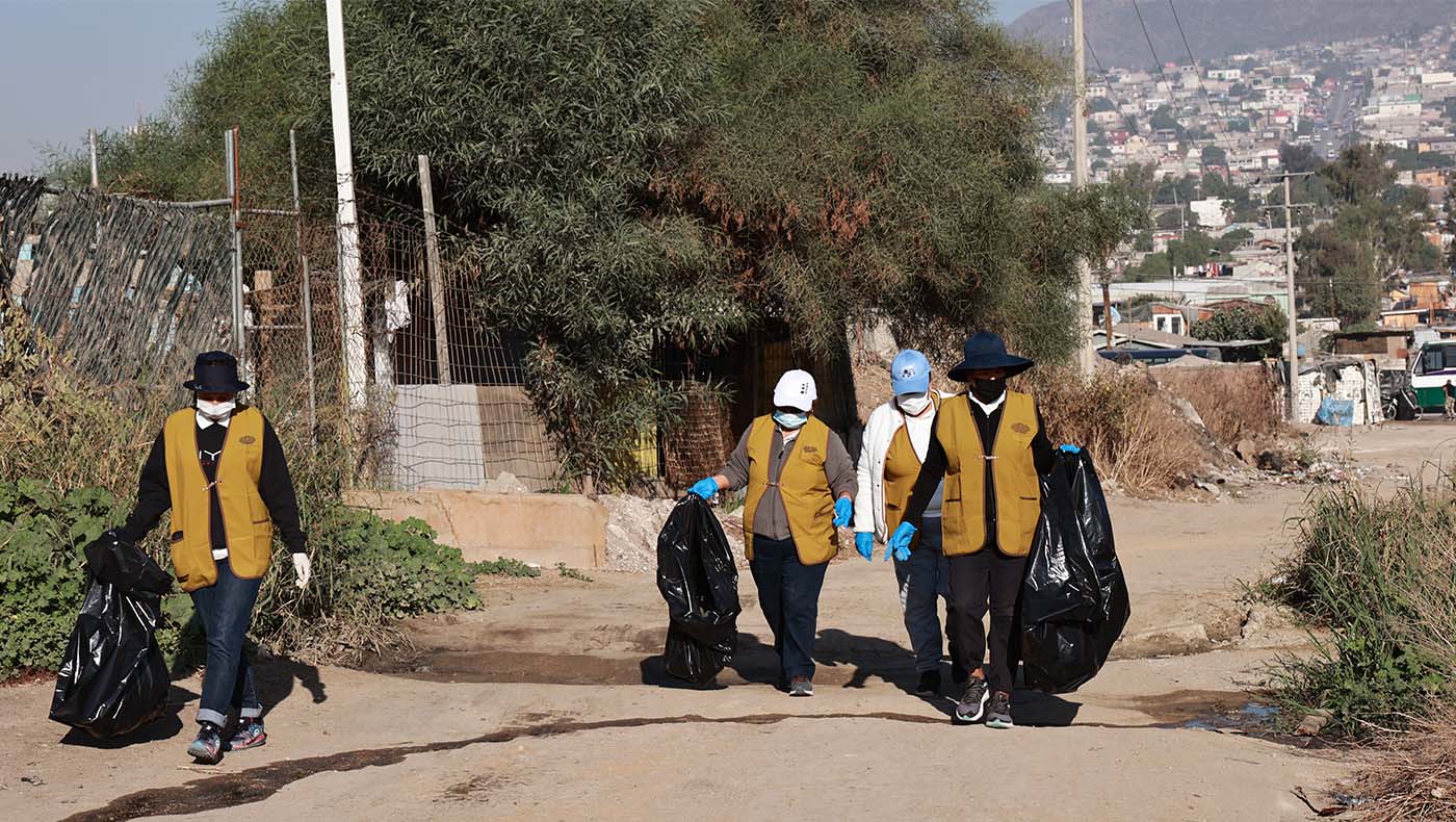 Tzu Chi volunteers recycling trash from the street in Tijuana