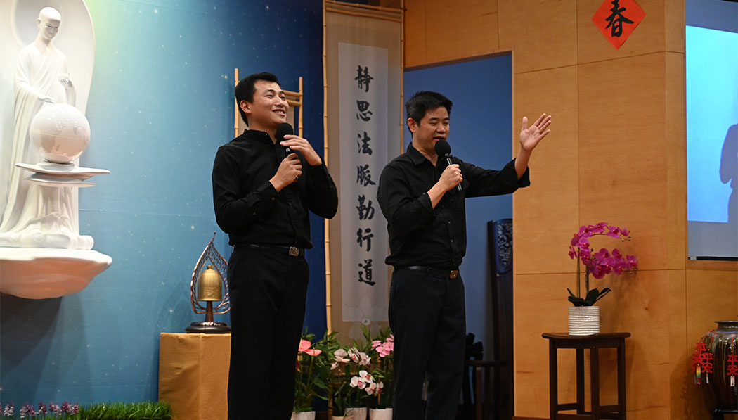 Tzu Chi volunteers giving speech