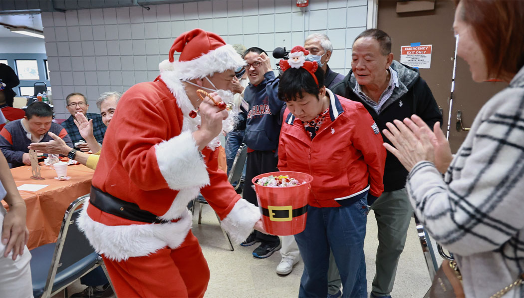 Santa Claus giving out gifts
