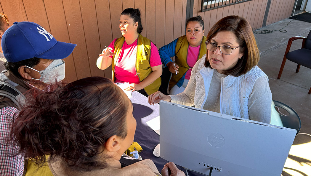 City councilor in Tijuana, Mexico and volunteers were on hand to help people register online