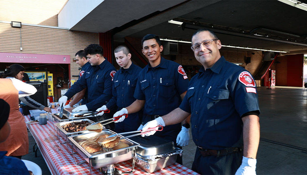 Fire fighters Prepare delicious breakfast for visiting families