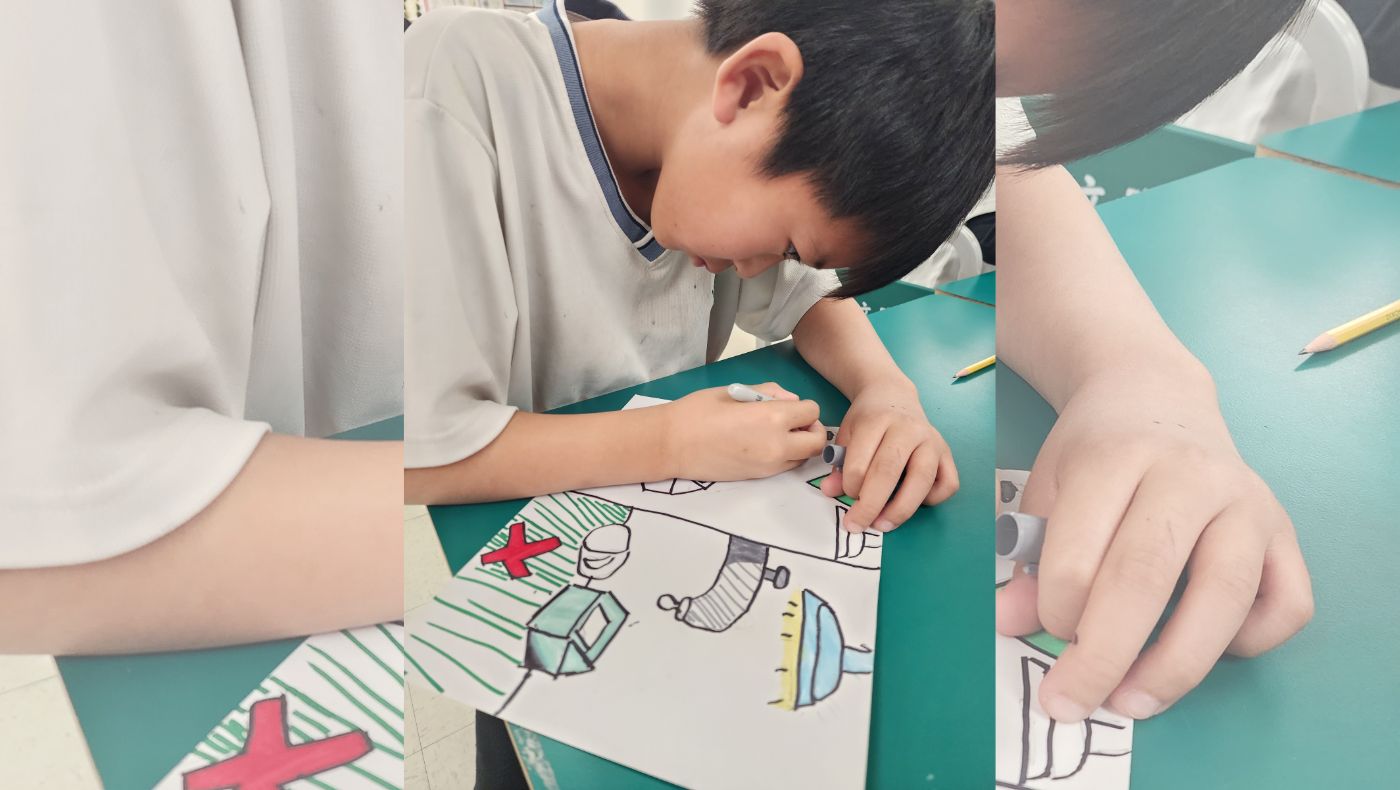 Students from Walnut Ci Primary School used paintbrushes on paper to outline the projects they wanted to complete this time.