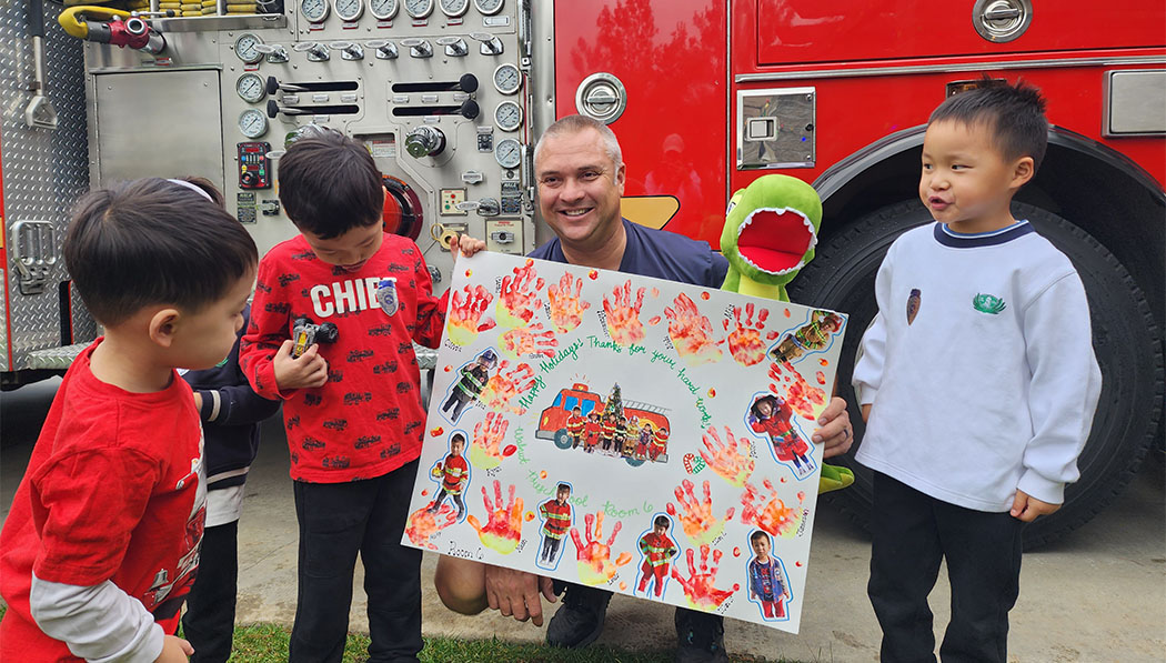 the firefighters happily took photos with the children