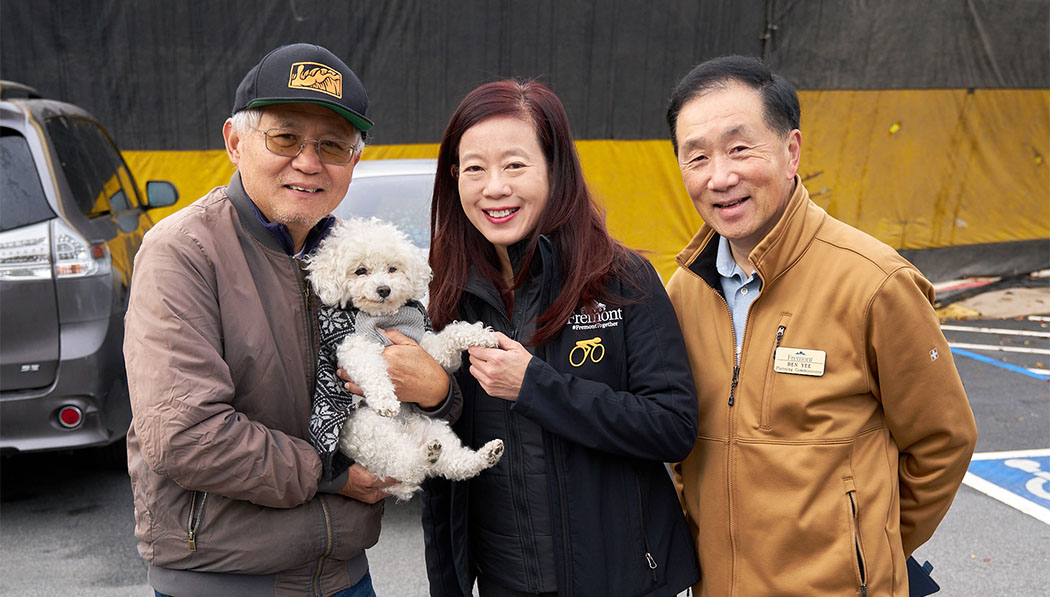 Lily Mei and visitors with their dog