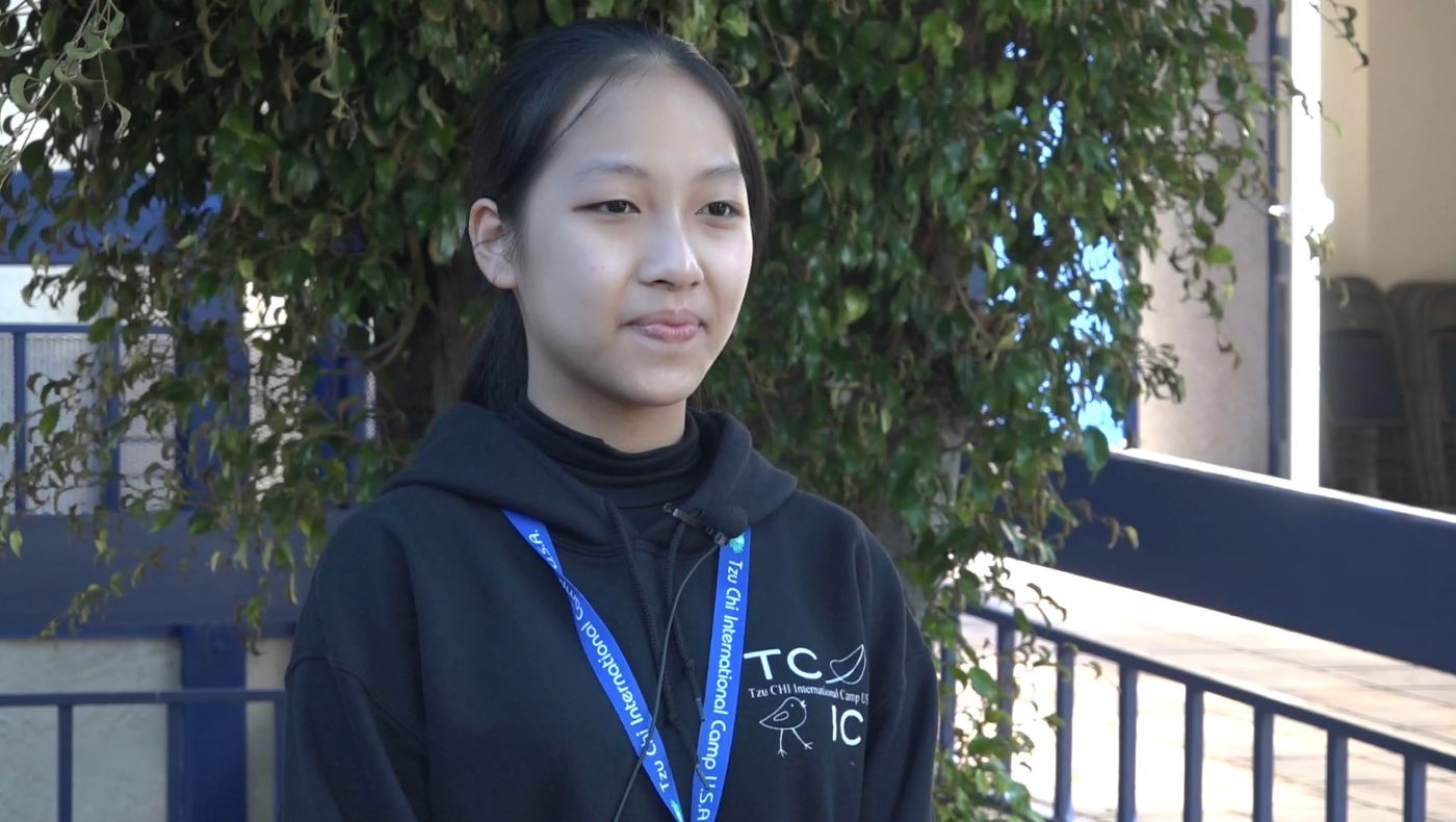 Yang Yongqing, a student at Tainan Tzu Chi Middle School, is grateful for the warmth Tzu Chi volunteers bring to her home.