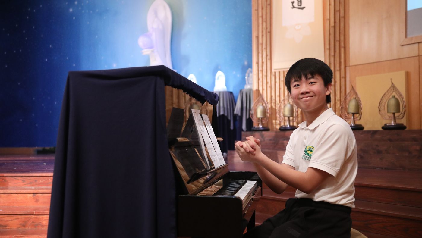Students from Houston Humanities School happily performed the piano song "There is Love in the World".