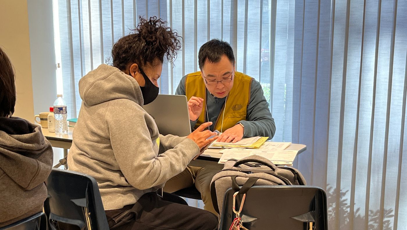 Volunteers assisted people with tax preparation at the second stop.