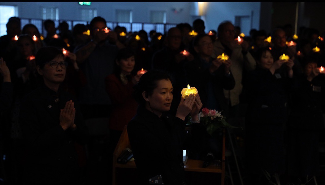 everyone holding blessing light