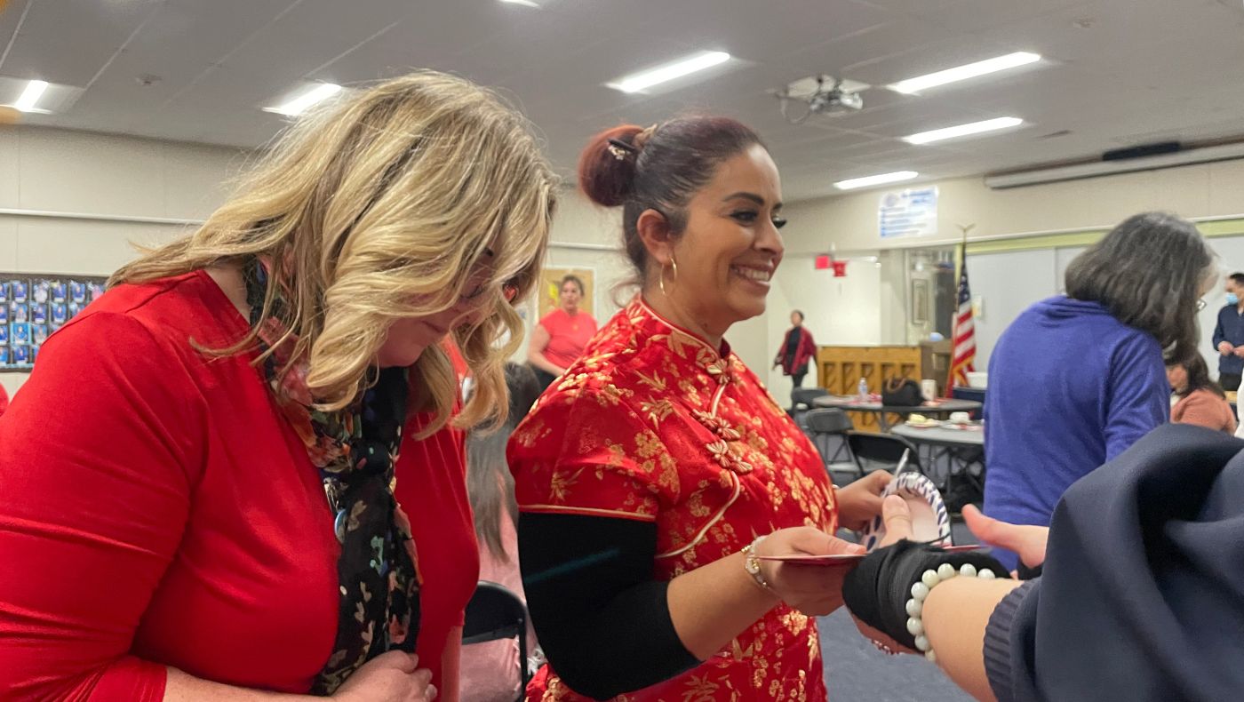 Jessica Bingas, a teacher at Xianlin Primary School, attended the Year of the Dragon New Year dinner in festive traditional Chinese clothing.