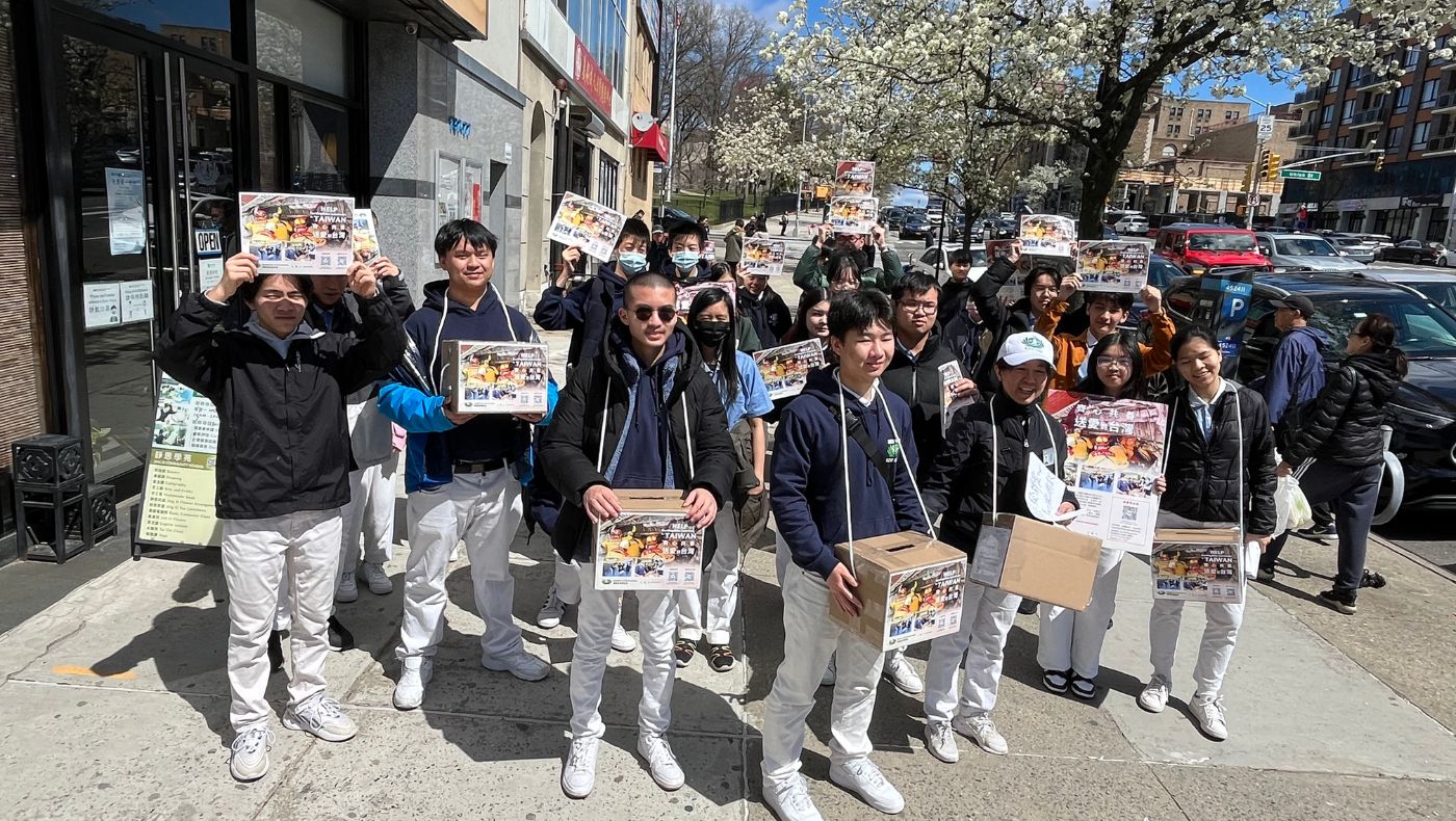The Tzu Chi boys took to the streets to raise funds and were very excited and happy.