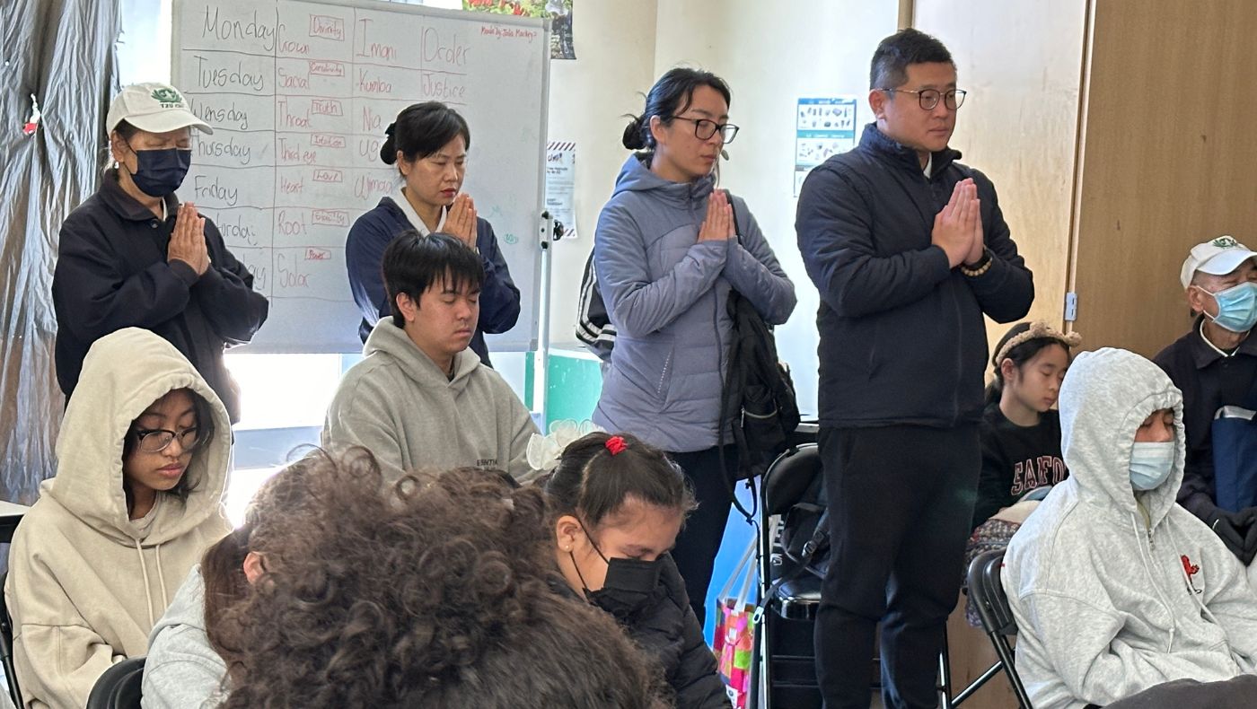 Volunteers and people from the Happy Community in Hunters Point prayed and blessed the Taiwan earthquake victims.