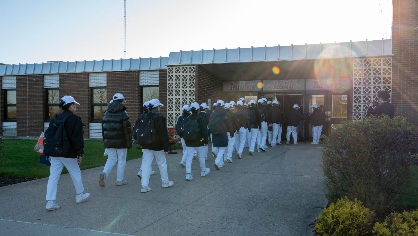 Volunteers line up to enter Indian Lake High School.