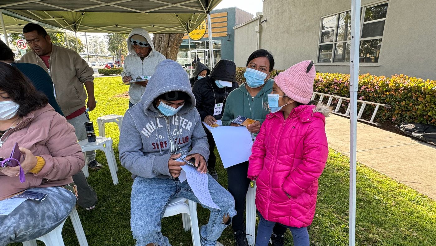 Patient Tania Peralta and her children got up early to queue up for the free clinic.