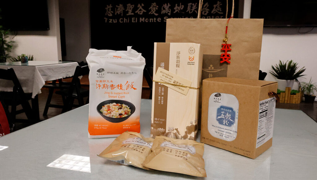 The care packs contained instant noodles, multi-grain cereal, rice cereal, and crackers prepared by masters of the Jing Si Jing Abode.