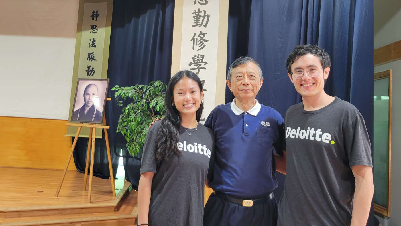 Deloitte volunteers Cat-Thy Dang (left), Raphael Fepres (right), and Hank Chi (center) joyfully pose for a photo, leaving behind unforgettable memories. Photo/Wendy Tsai