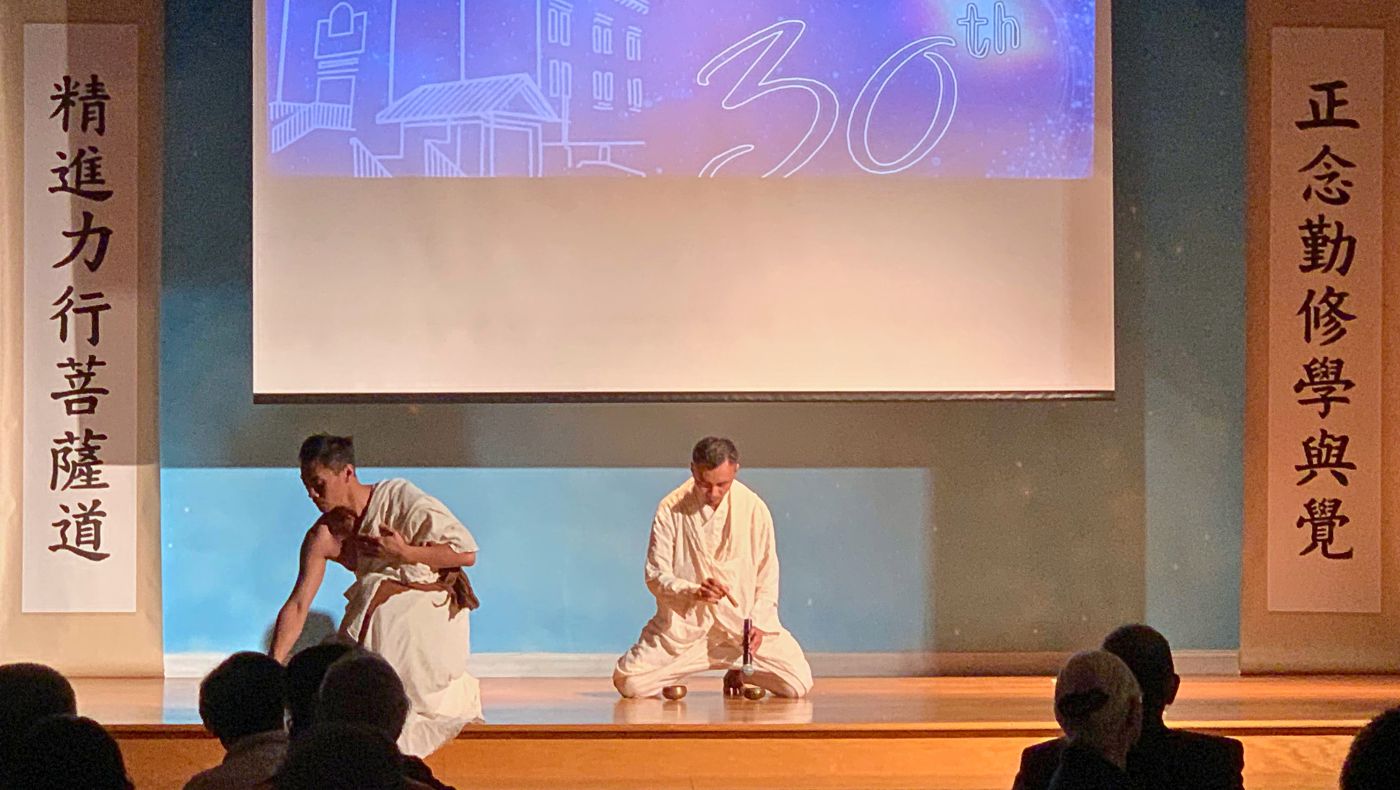 Dancers use their bodies and facial expressions to convey the stories and situations of Tzu Chi. Photography by Zhou Yenong.